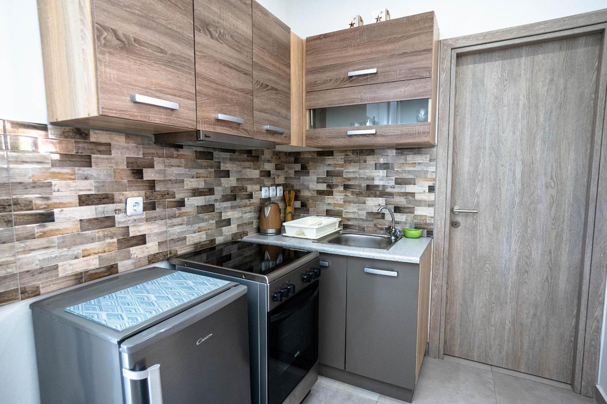 أليكيس Golden Dolphin Studios & Apartments الغرفة الصورة